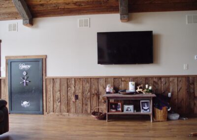reclaimed mushroom boards used for wall paneling in a home with a TV