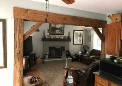 reclaimed mushroom boards used for custom entryway into the living room