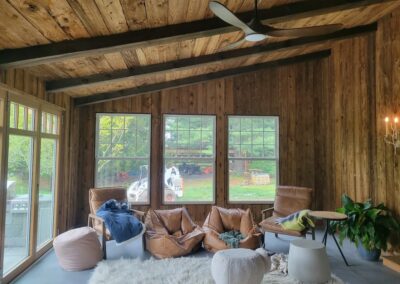 reclaimed mushroom boards used for wall paneling and ceiling in a custom room addition